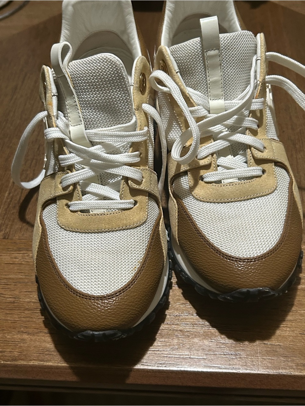 Louis Vuitton  white and brown sneakers.